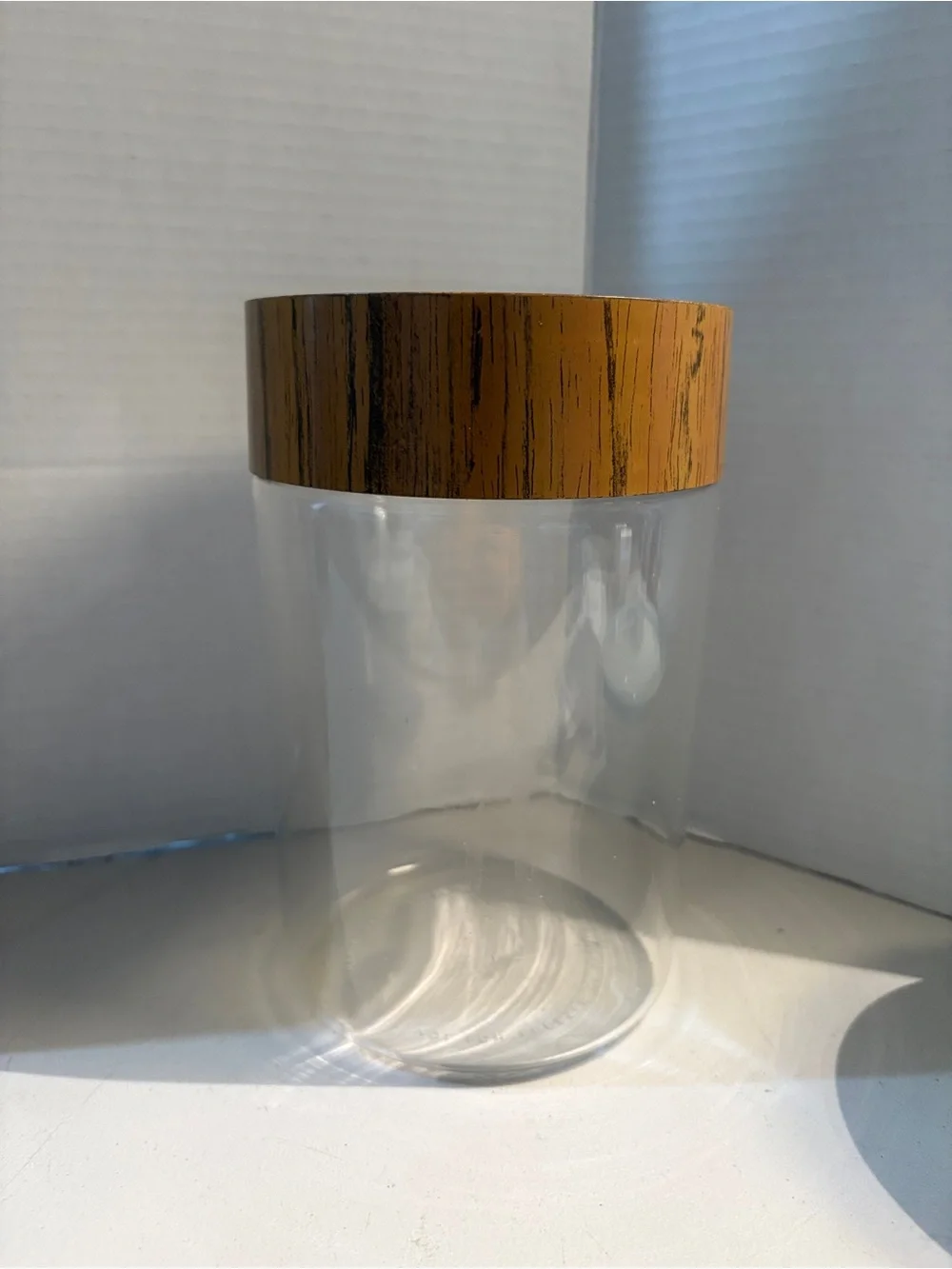 Vintage 1970s Pyrex canister with wood grain lid 7”